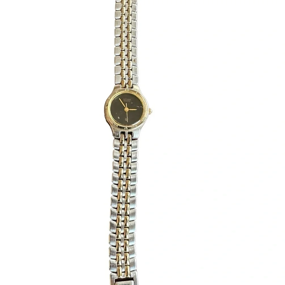 Citizen ladies two-tone black face watch with Roman numerals bezel